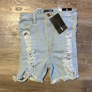 Fashion Nova Light Blue Ripped Denim Shorts